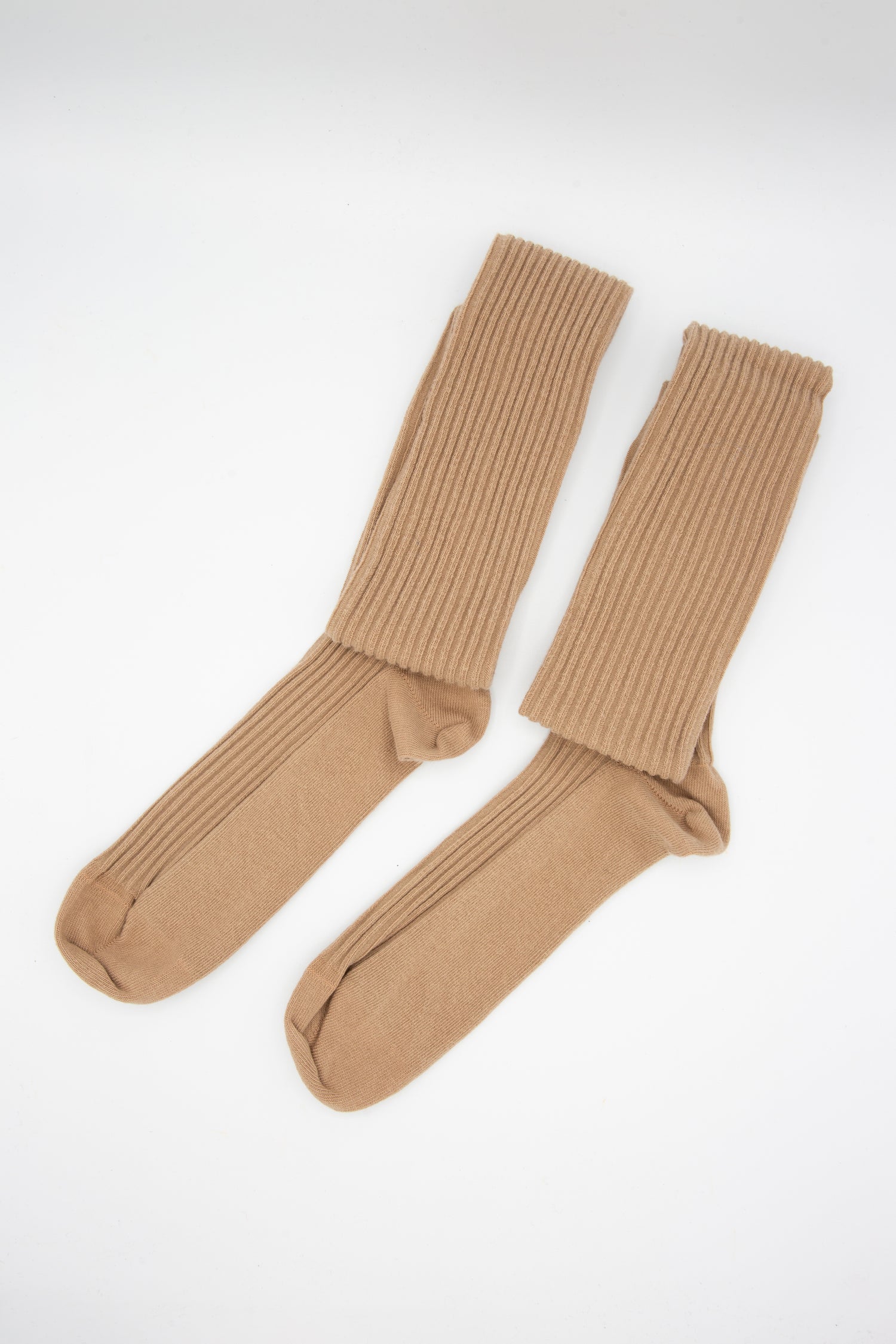 A pair of sustainably produced Baserange Overknee Socks in Brandy, made from an organic cotton blend, showcased on a white background.
