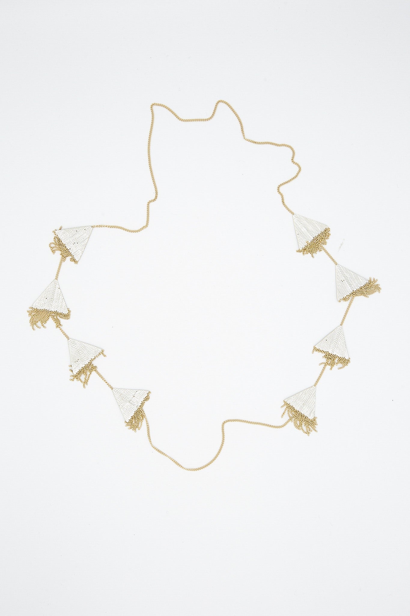 A Hannah Keefe Triangle Necklace in Brass Chain and Silver Solder with geometric forms.