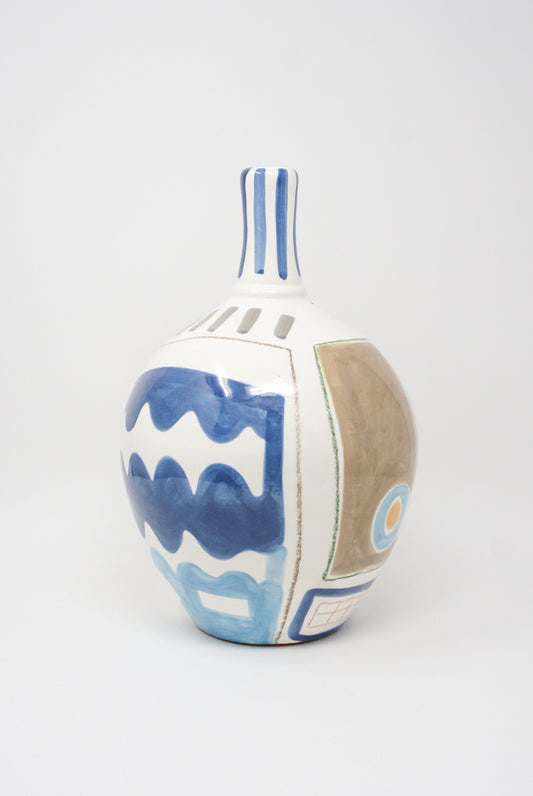 A Hand Painted Vase - HALIA by LRNCE, with a blue and white design on it.