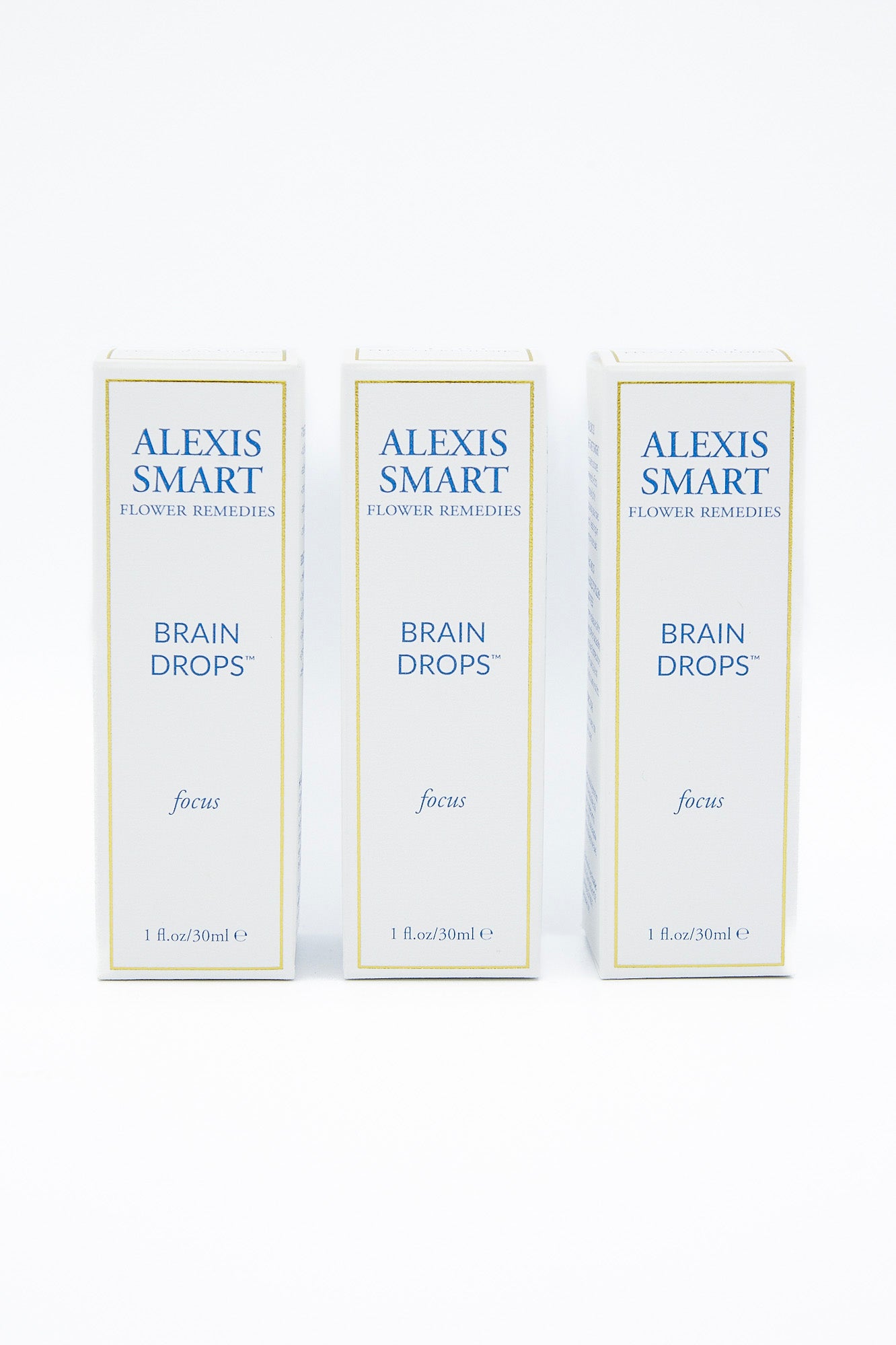 Three boxes of Alexis Smart Flower Remedies - Brain Drops designed to enhance attention and focus, and improve memory, placed on a white background.
