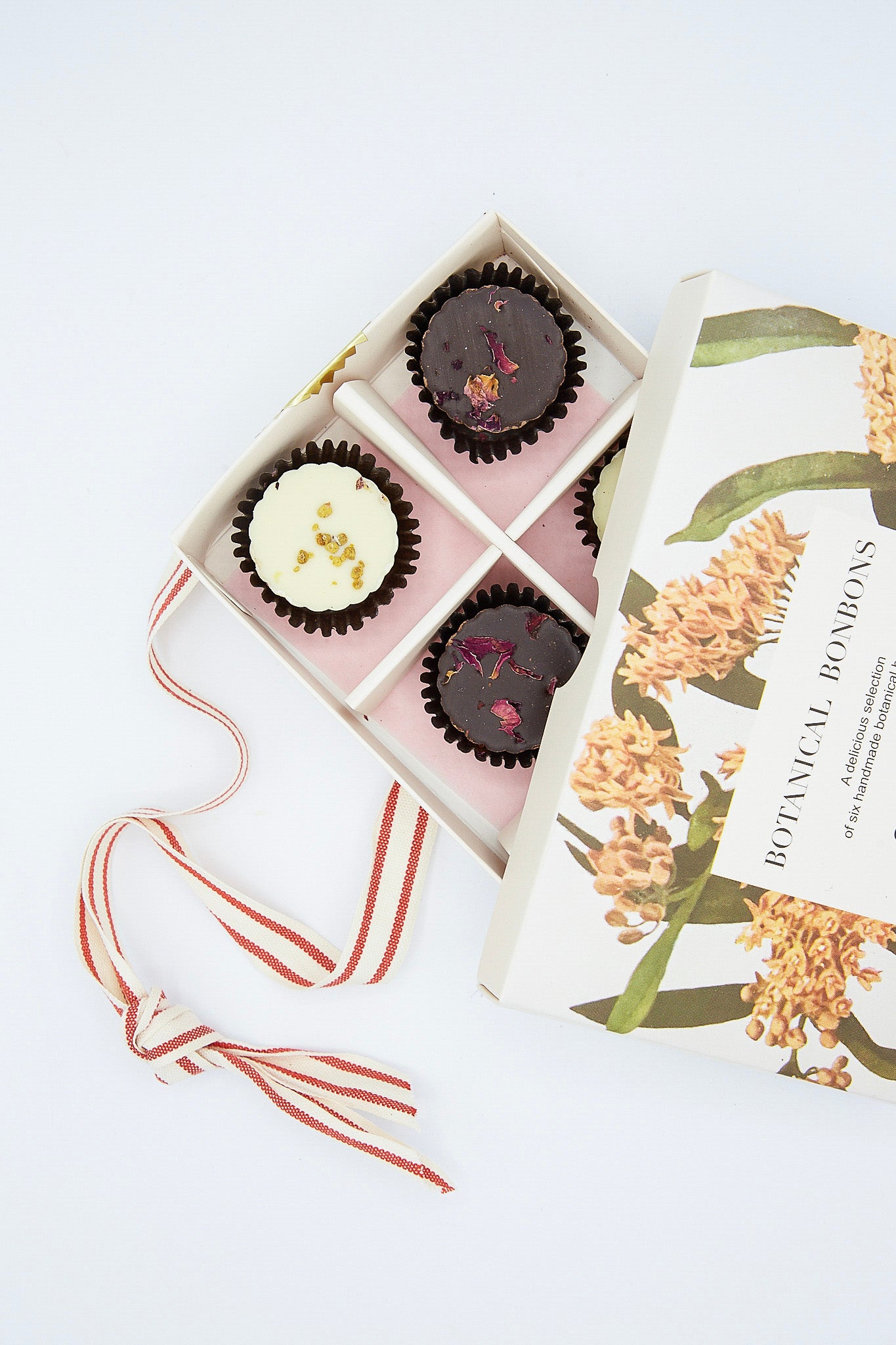 A limited edition box of Chocolate Botanical Bon Bons filled with botanical inspired Bon Bons from The Quiet Botanist.