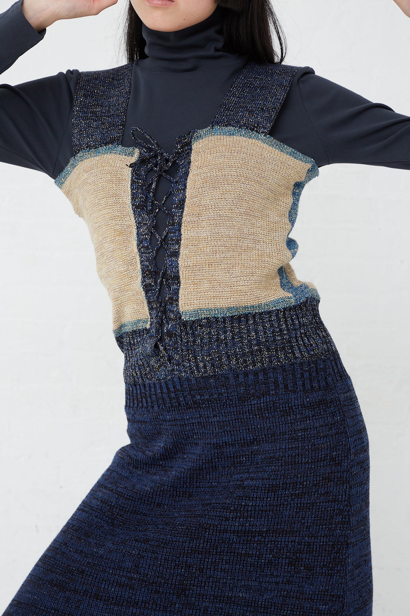A woman in an Intensity Optic Dress in Blue C. Up close.