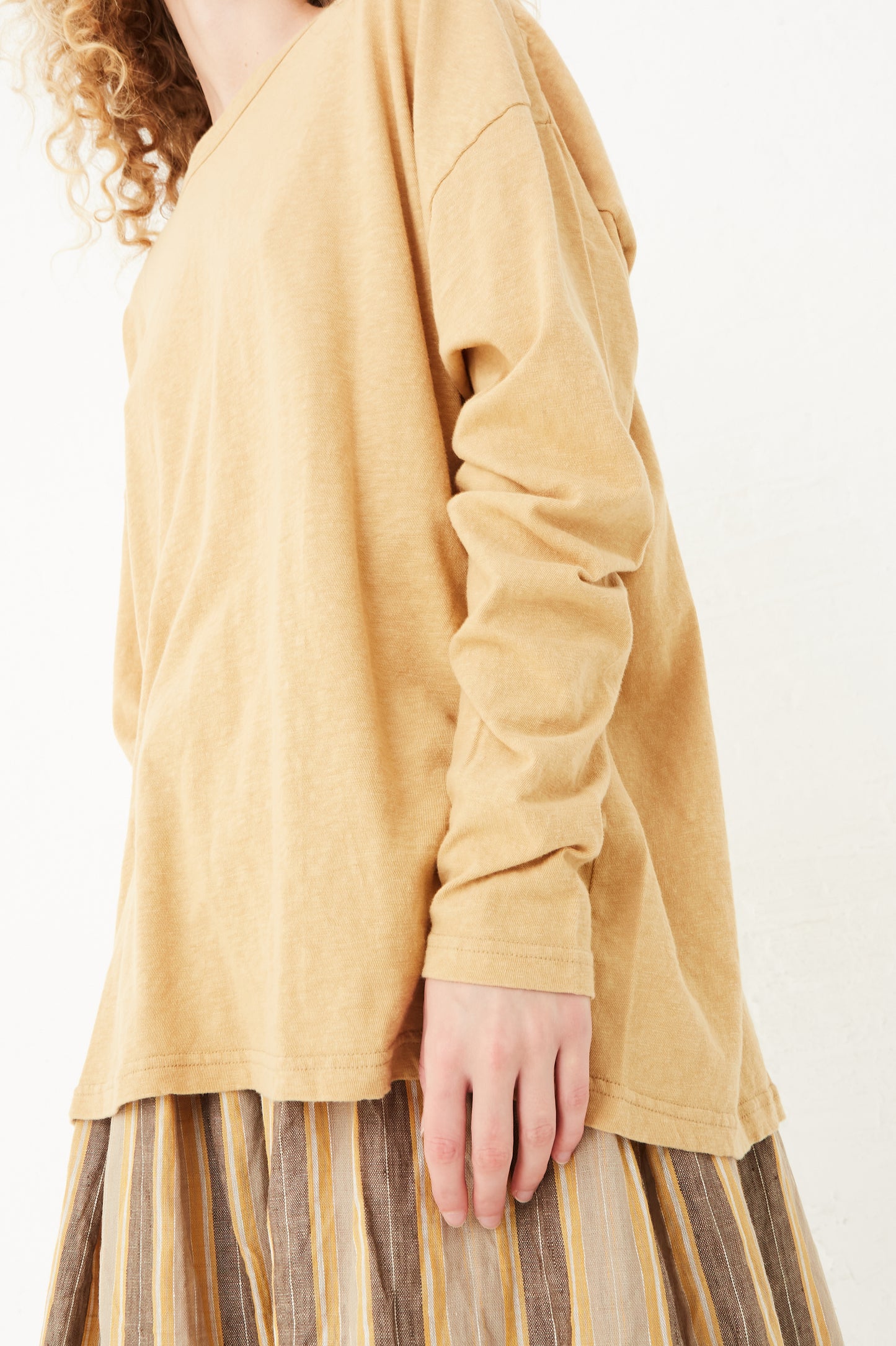 A model wearing an Ichi Antiquités Cotton Loose Pullover in Camel, available at Oroboro store in NYC.