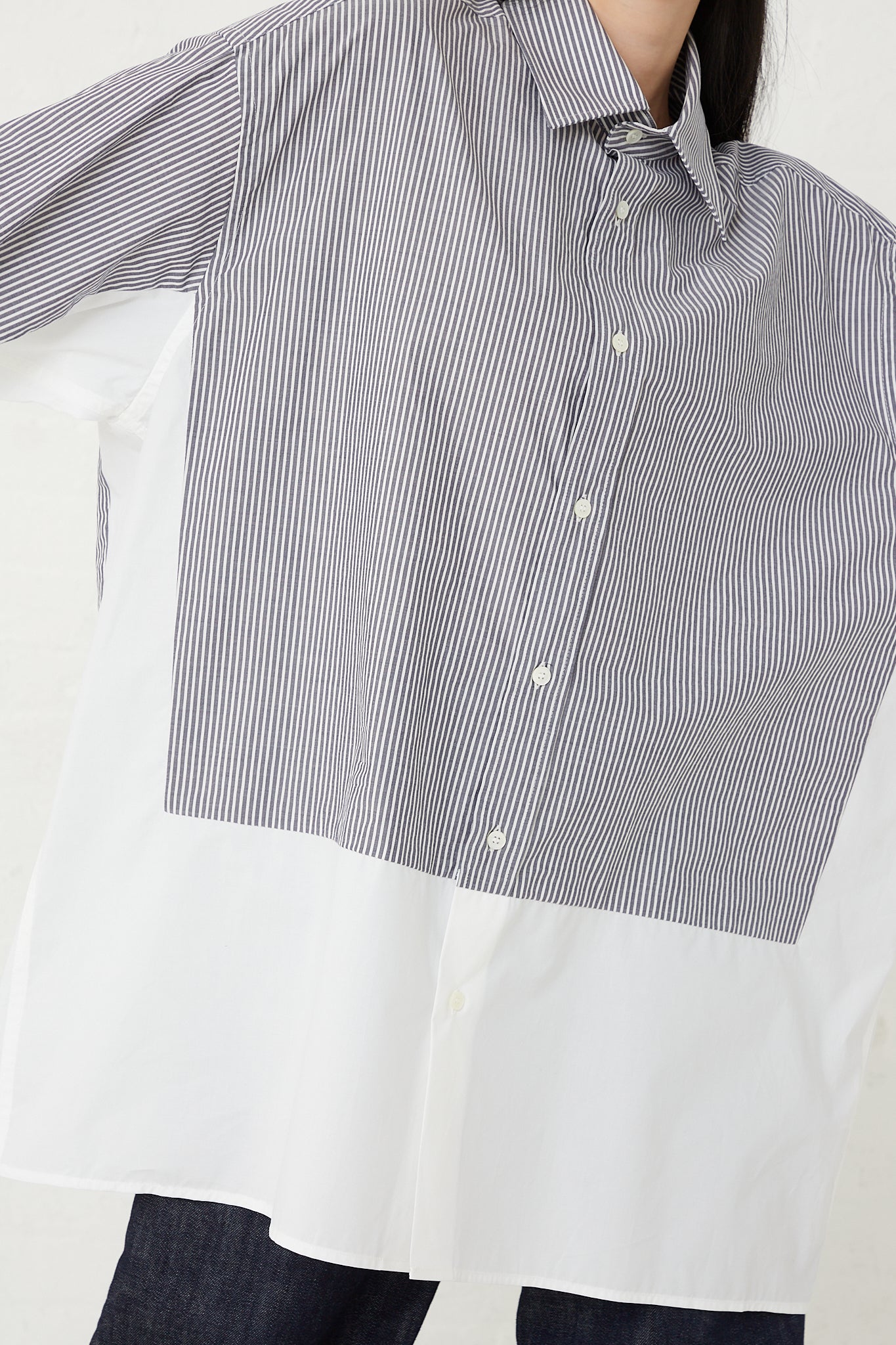 An oversized fit woman's button-front MM6 shirt made of striped Cotton Long Sleeved Shirt in Dark Grey and White.