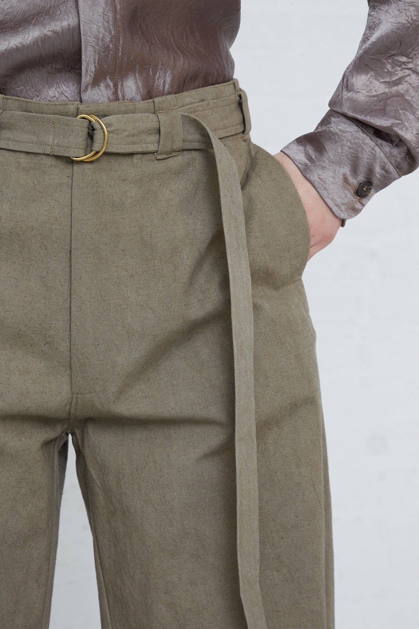 A woman wearing Lauren Manoogian's Belted Trouser in Fatigue pants.