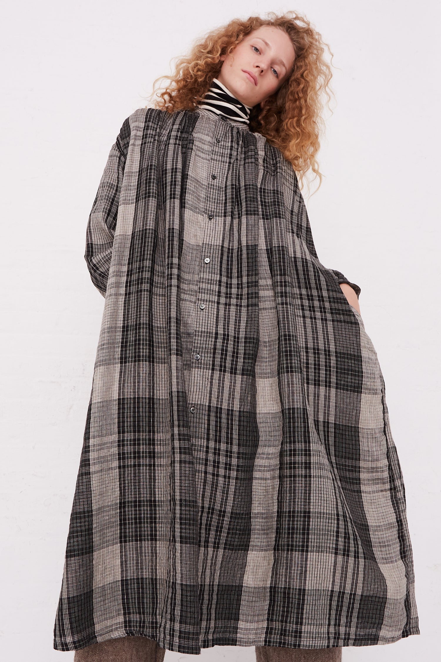 A model wearing the Ichi Antiquités Linen Big Check Dress, available at Oroboro store in NYC.