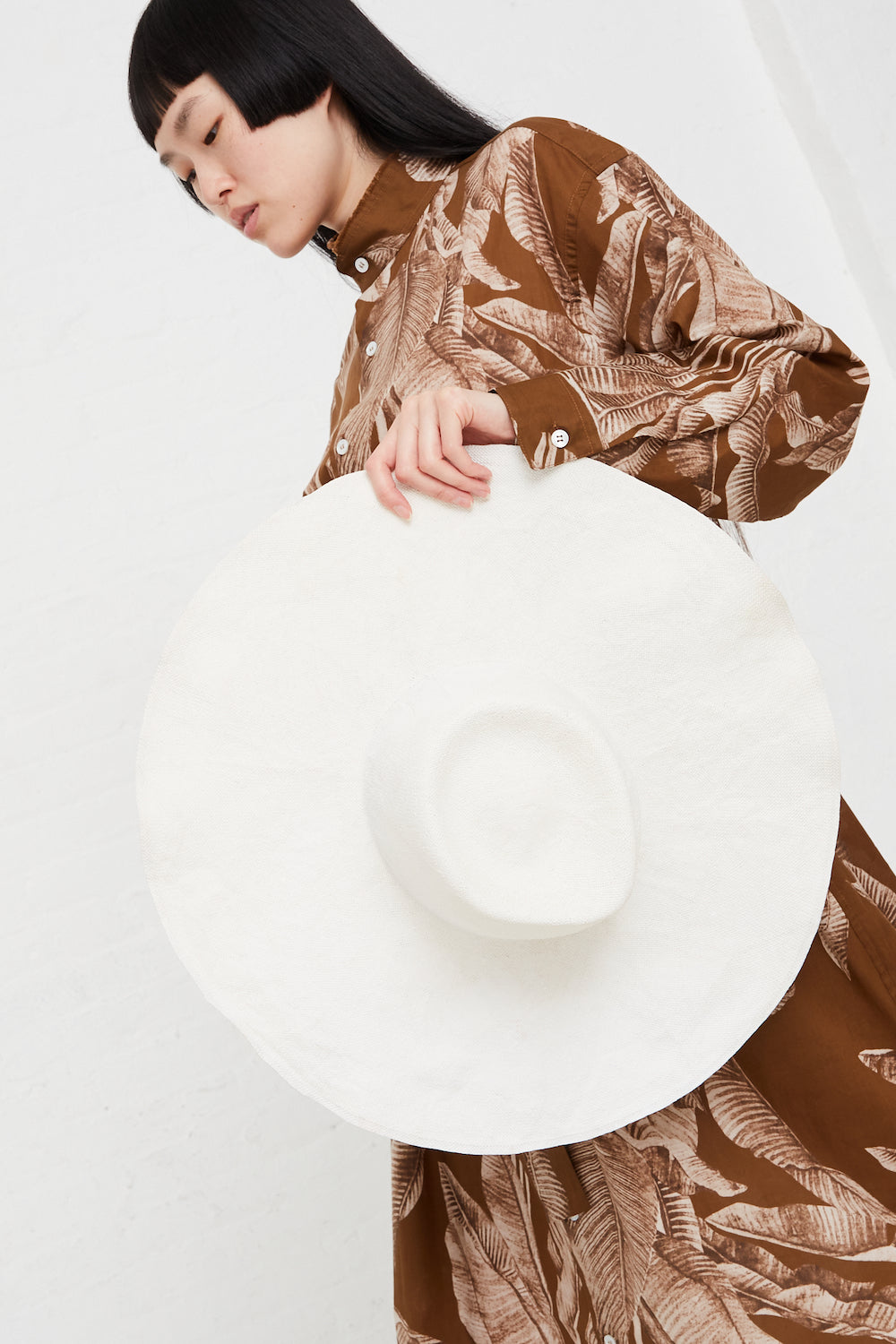 Reinhard Plank - Nana Flower Viscose Hat in White full front view on model.