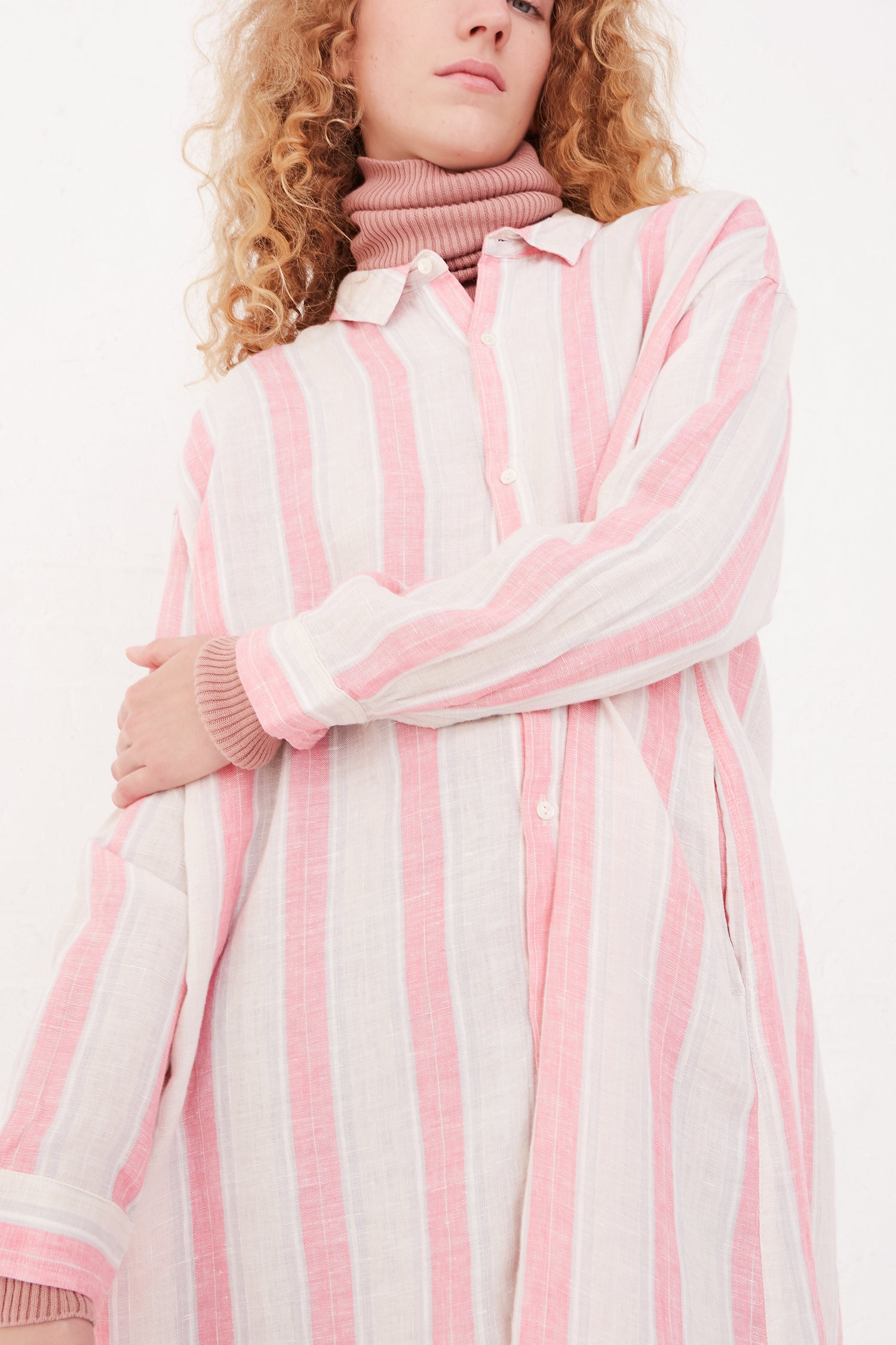 A woman wearing the Linen Stripe Dress in Pink by Ichi Antiquités.