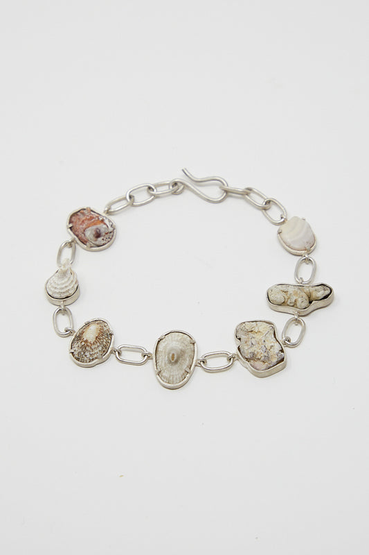 A La Mar sterling silver bracelet adorned with found shells on a delicate chain.