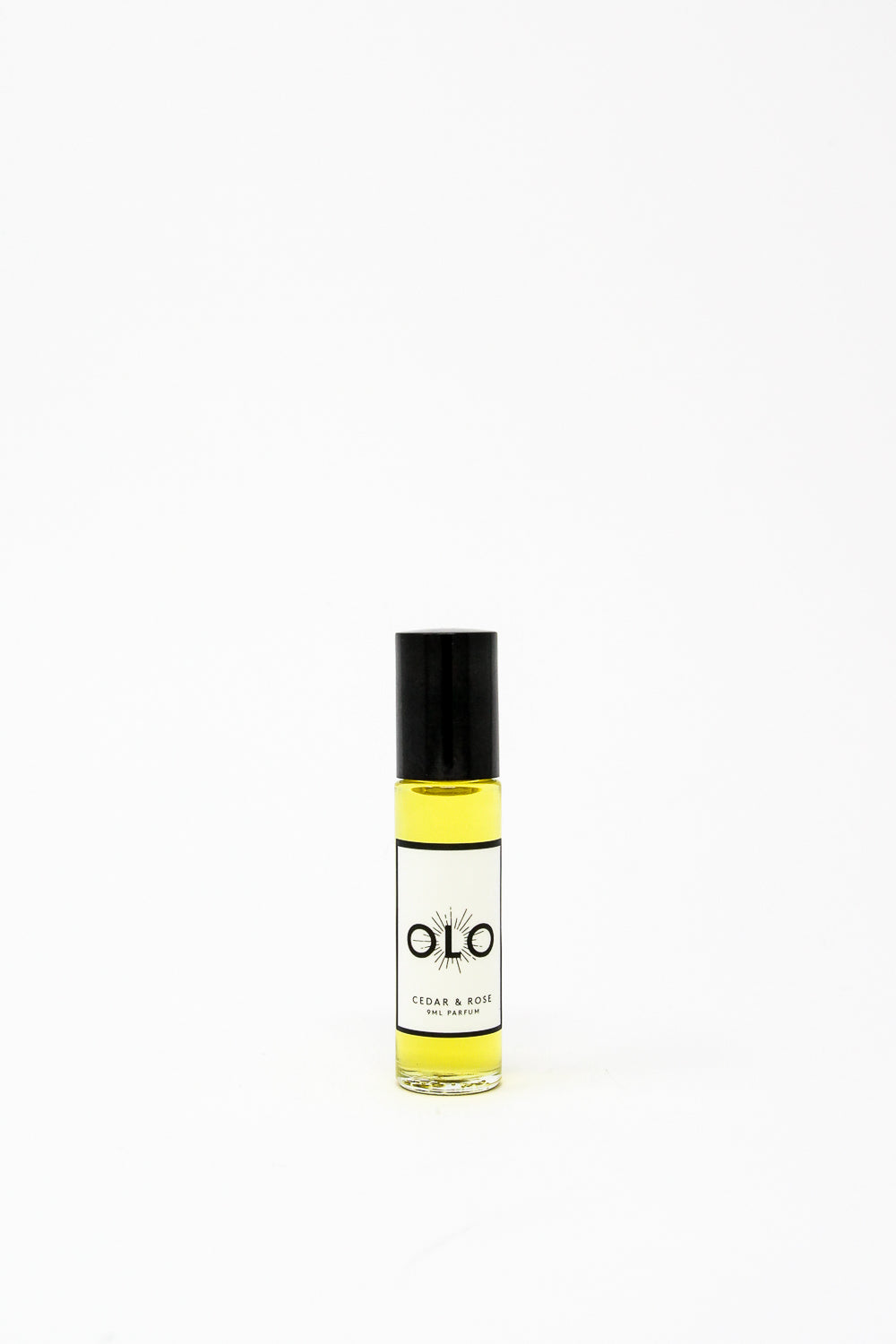 A 9ml OLO perfume bottle labeled "Cedar & Rose" displayed on a plain white background.